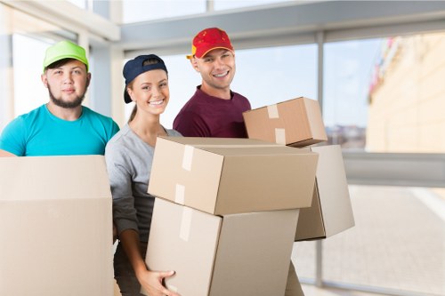 Flat removals in Cowley with moving van and packed boxes