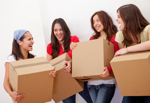 Person organizing belongings in a Cowley storage unit