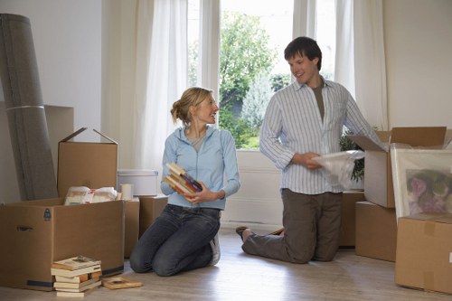 Team preparing for office removals in Cowley with labels and inventory
