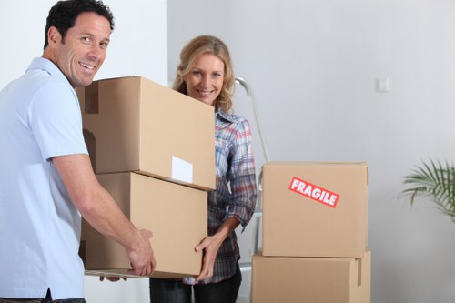 Packed office furniture and moving crates prepared for Cowley relocation